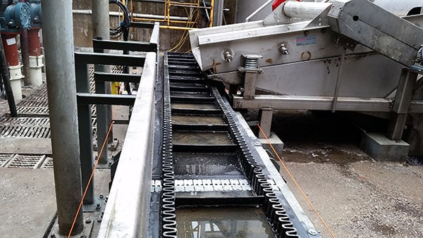 Flex-Wall Belt Wall Conveyor to Remove Food Waste for Hanover Foods in Hanover, PA - KWS