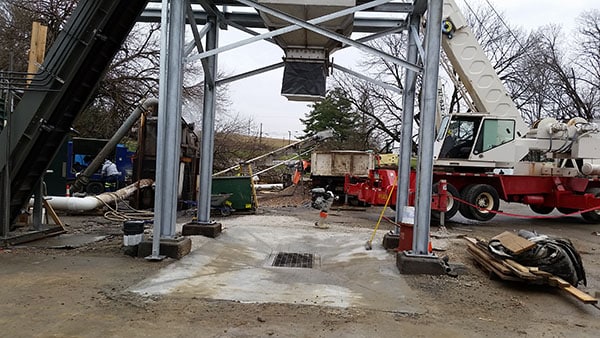 Flex-Wall Belt Wall Conveyor to Remove Food Waste for Hanover Foods in Hanover, PA - KWS