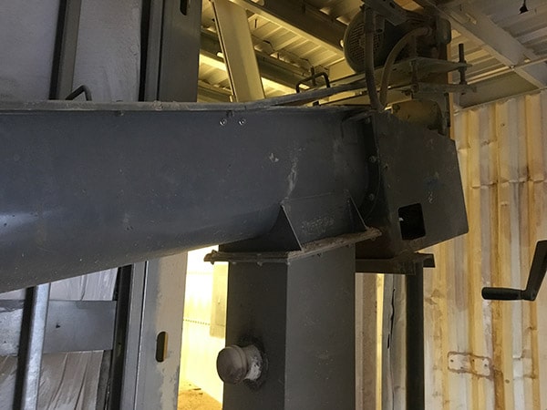 Inclined Screw Conveyor Replaces Tubular Drag Conveyor at Shaw Industries in Dalton, GA