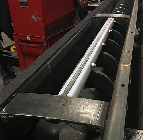 Inclined Shaftless Screw Conveyor for Metal Cuttings - KWS Manufacturing