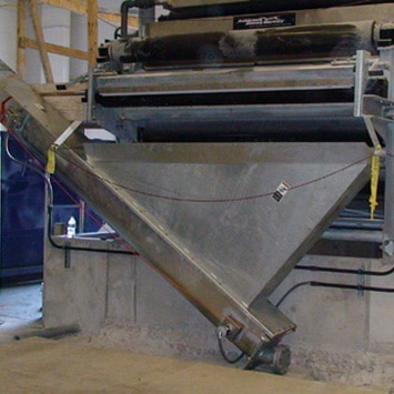 Inclined Shaftless Screw Conveyor for Transferring Biosolids at Devens WWTF in Devens, MA - KWS Manufacturing