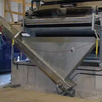 Inclined Shaftless Screw Conveyor for Transferring Biosolids at Devens WWTF in Devens, MA