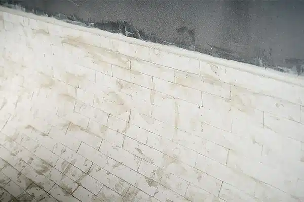 Grout Layer Between Trough and Liner achieves Seamless Internal Surface