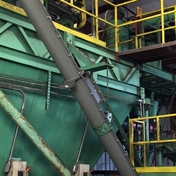 Conveying Size Reduced Rubber at Tire Recycling Facility - KWS Manufacturing