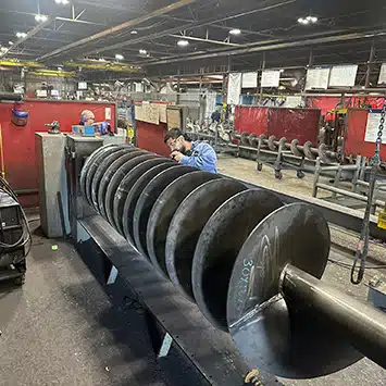 Expedited Replacement Mass-Flow Screw Prevents Costly Paper Mill Downtime