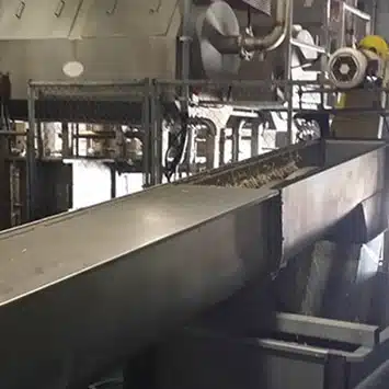 Inclined Screw Conveyors & Truck Load-Out Conveyors to Convey Offal Meat & Feathers at a Mountaire Farms Chicken Processing Plant