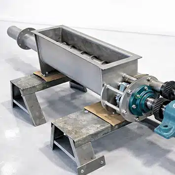 High Temperature Screw Feeder for Metering Abrasive and Corrosive Bulk Materials