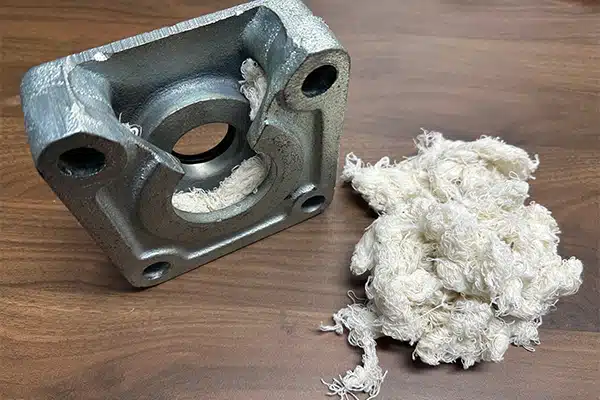 Packing Material is Easily Installed into Waste Pack Cavity
