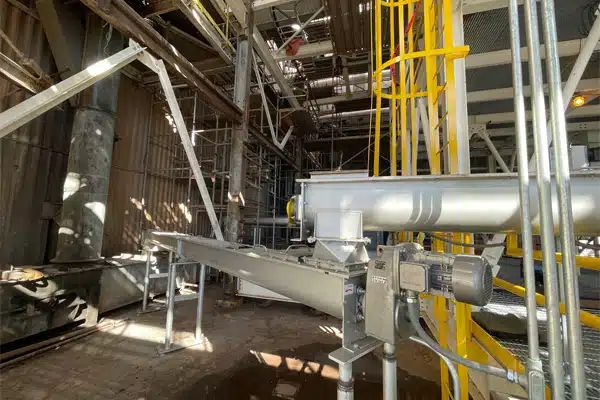 New KWS Screw Conveyors Transfer Flyash to Existing Drag Conveyor