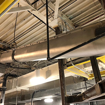 Screw Feeder Keeps Soda Ash Flowing for Packaging Operation - KWS Manufacturing