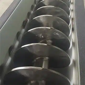 Screw Feeder to Meter Ingredients for Animal Feed Blocks