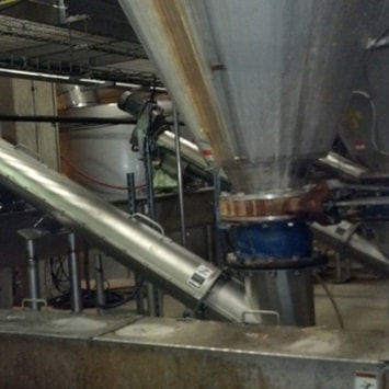 Metering and Conveying Spent Brewer’s Grain - KWS Manufacturing